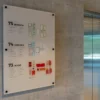 Interior building signage enhances navigation and aesthetics within indoor spaces.