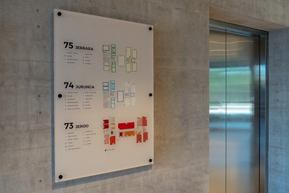 Interior building signage enhances navigation and aesthetics within indoor spaces.