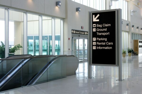 The company invested in indoor business signage to improve navigation and promote brand identity within their office space.