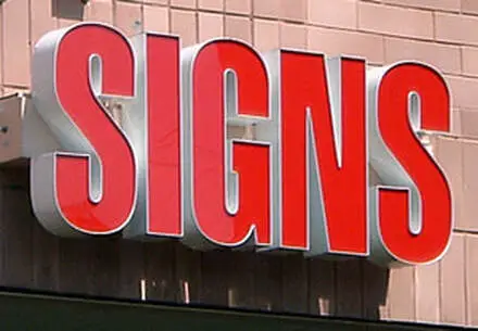 A high-quality sign board Dubai displaying a custom business logo with vibrant colors and clear typography.